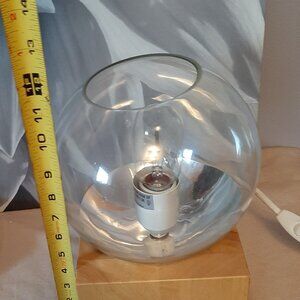 Solid wood base with glass globe lamp